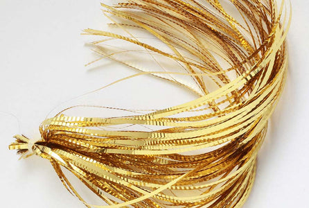 Du tilføjede <b><u>Flashabou lateral scale - Gold</u></b> til kurven.