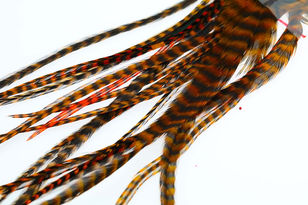 Selected Gedde Sadelfjer - Grizzly Orange